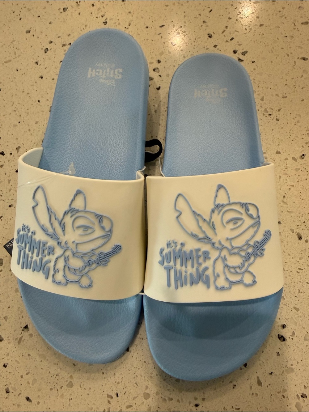 New women’s Sz 7, 8 Disney Light Blue and White Stitch Slide Sandals